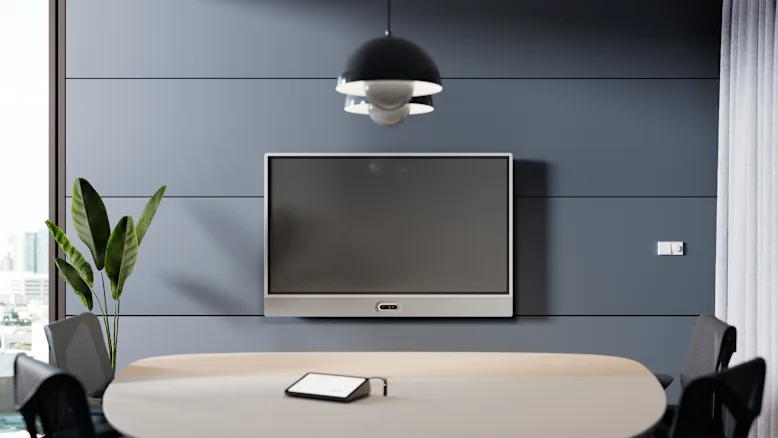 Logitech Rally Board 65 wall-mounted in a meeting room